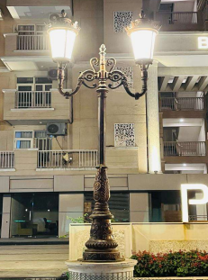 Decorative double arm post top light